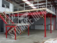 Steel platted red structural flooring on stairs