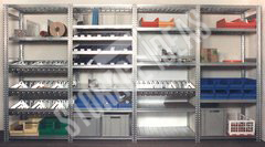 A big metal shelves with different storage compartments