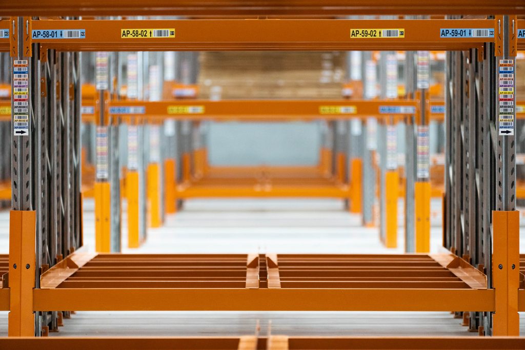 Orange color deep pallet racking for product storage